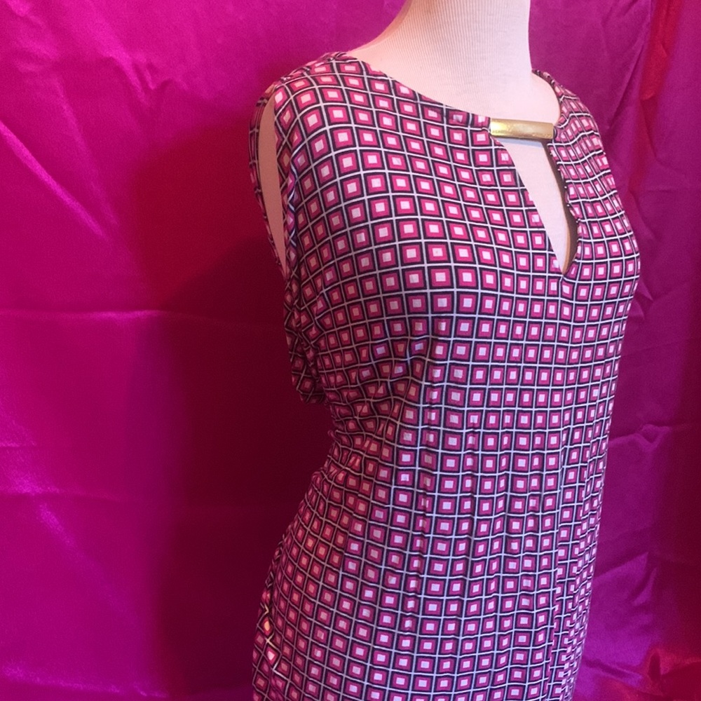 Michael Kors top size S, Fits like a L. Hardware in Centre